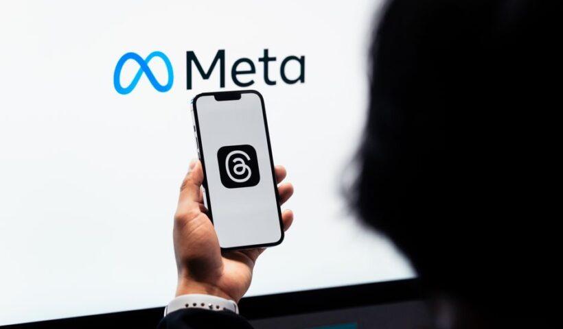 Логотип Meta та символ стейблкоіна USDC на цифровому фоні