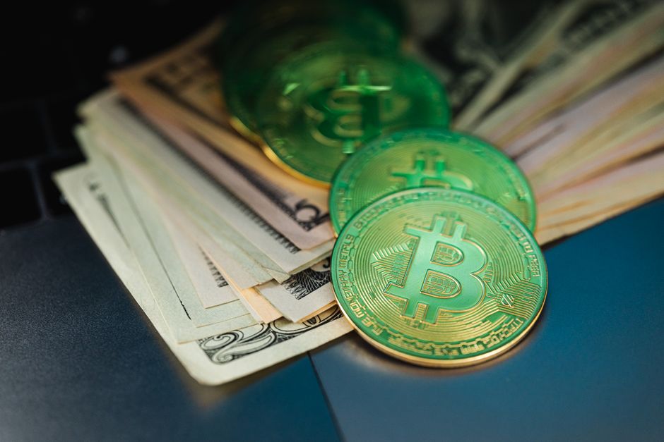 Bitcoin coin on semiconductor chips background with Japanese yen banknotes